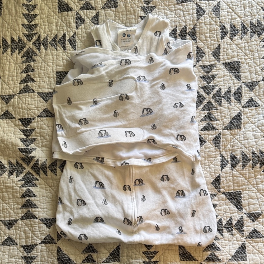 Halo baby swaddle with penguins